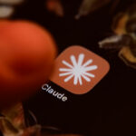 The Claude app icon is displayed on a smartphone screen