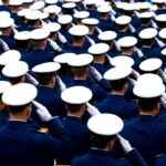 U.S. Air Force Academy cadets salute during their graduation ceremony on May 28 in Colorado Springs, Colorado.