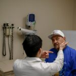 José Najera performs a series during vascular checkup following a recent operation on a carotid artery at the San Francisco VA Medical Center June 4, 2019.  (Josie Norris/San Francisco Chronicle via AP)