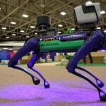 Spot, the robotic security dog made by Boston Dynamics, walks inside the International Broadcast Center on June 01, 2026 in Dallas, Texas.