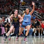 Fever star Caitlin Clark drives against Chicago Sky player Jacy Sheldon