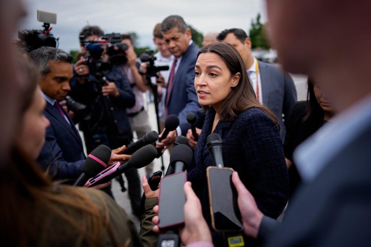 Representative Alexandria Ocasio-Cortez addresses reporters as she arrives for the final votes of the week at the U.S. Capitol on May 21 in Washington, D.C. (Photo by Andrew Harnik/Getty Images)