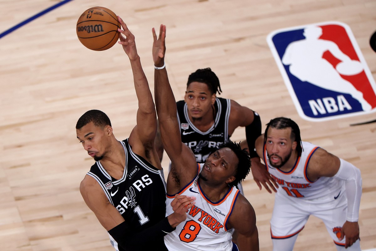 NEW YORK, NEW YORK - JUNE 10: Victor Wembanyama #1 of the San Antonio Spurs and OG Anunoby #8 of the New York Knicks compete for a jump ball during the second quarter in Game Four of the 2026 NBA Finals at Madison Square Garden on June 10, 2026 in New York City. (Photo by Dustin Satloff/Getty Images)