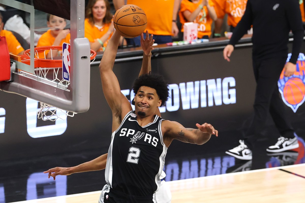 SAN ANTONIO, TEXAS - JUNE 03: Dylan Harper #2 of the San Antonio Spurs attempts to dunk the ball against Mikal Bridges #25 of the New York Knicks during the first quarter in Game One of the 2026 NBA Finals at Frost Bank Center on June 03, 2026 in San Antonio, Texas. (Photo by Gregory Shamus/Getty Images)