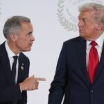 US President Donald Trump greets Canada's Prime Minister Mark Carney during a summit on Gaza in Sharm el-Sheikh on October 13, 2025.