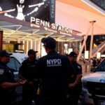NYPD police officers are seen outside Penn Station in New York on June 7, 2026. Six people were wounded Sunday in a stabbing at New York's Penn Station, authorities said.