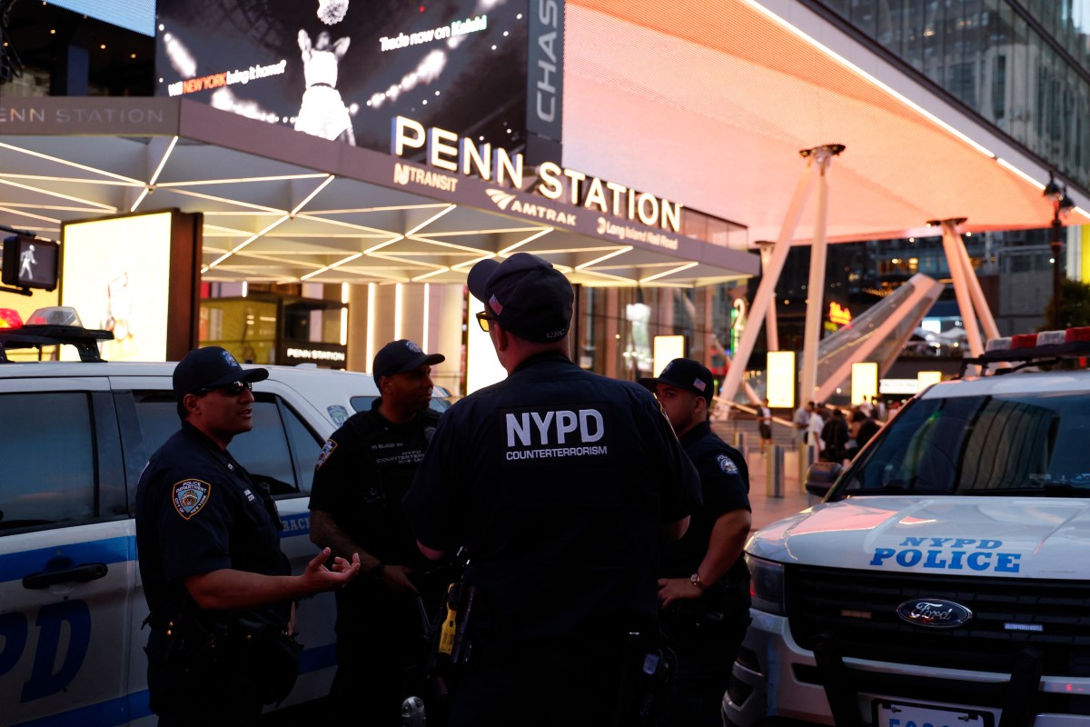 NYPD police officers are seen outside Penn Station in New York on June 7, 2026. Six people were wounded Sunday in a stabbing at New York's Penn Station, authorities said.