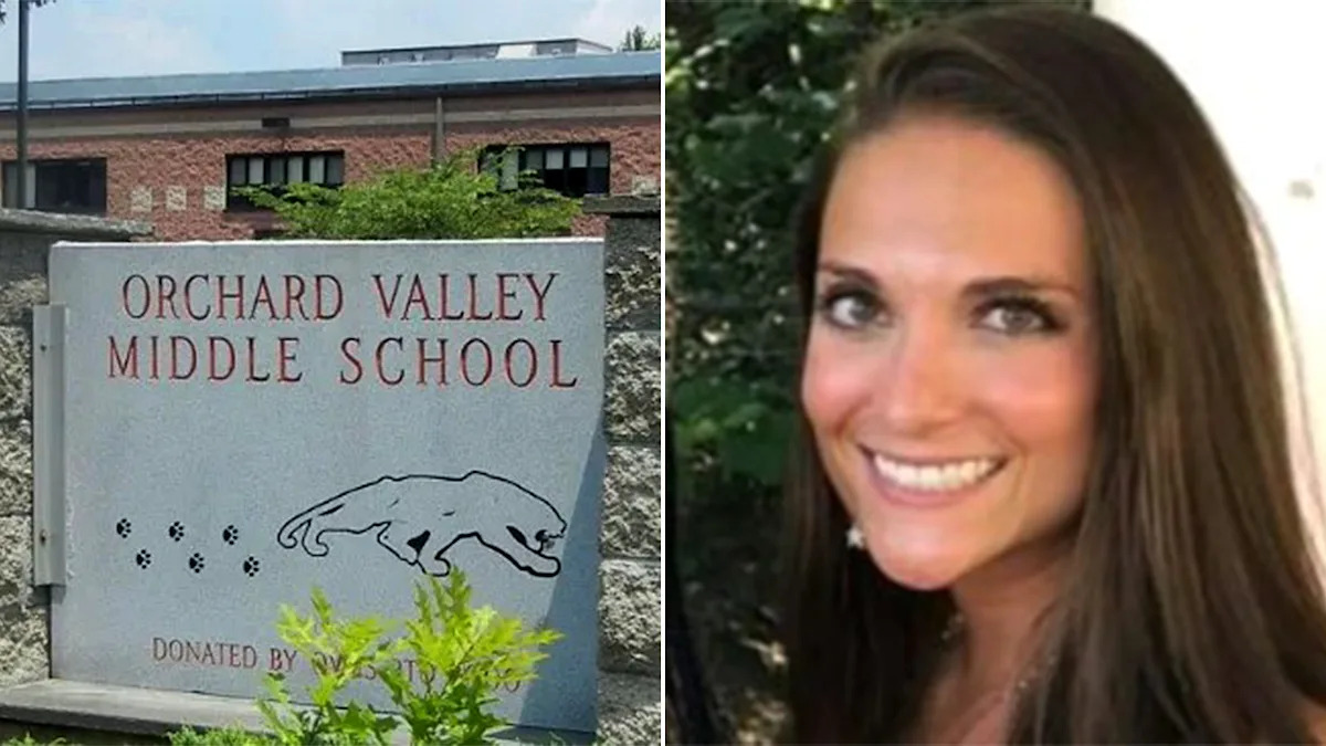 Ashley A. Fisler em frente à Orchard Middle School