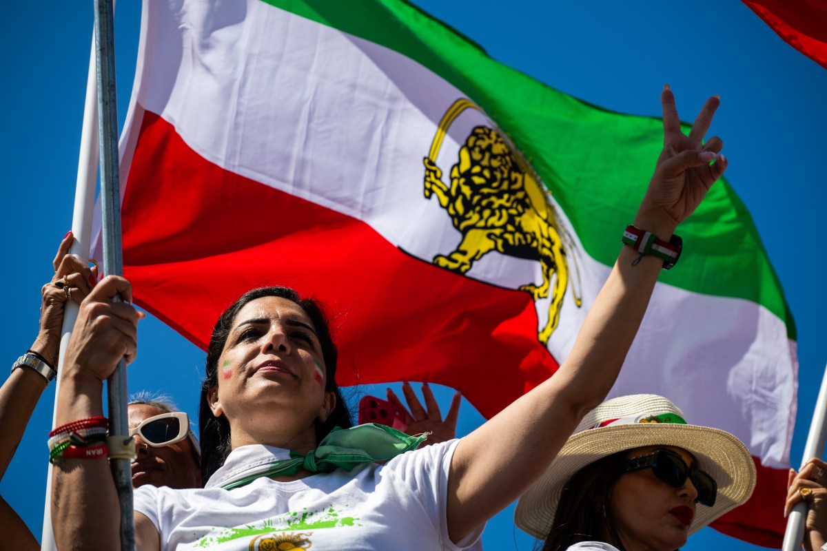 People protest FIFA's ban of Iran's pre-revolutionary flags inside World Cup stadiums in Inglewood, California, on Sunday.