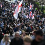 People march through the city after a protest over the police's handling of the arrest of Henry Nowak, at Southampton Central Police Station on June 2, 2026, in Southampton, England.
