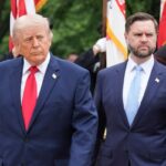 President Donald Trump and Vice President JD Vance walk to the Tomb of the Unknown Soldier in Arlington National Cemetery on Memorial Day, Monday, May 25, 2026, in Arlington, Va.