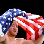 Justin Gaethje celebrates after winning main event fight against Ilia Topuria at UFC Freedom 250