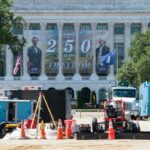 Workers build the Great American State Fair on the National Mall on May 28, 2026, in Washington, D.C.