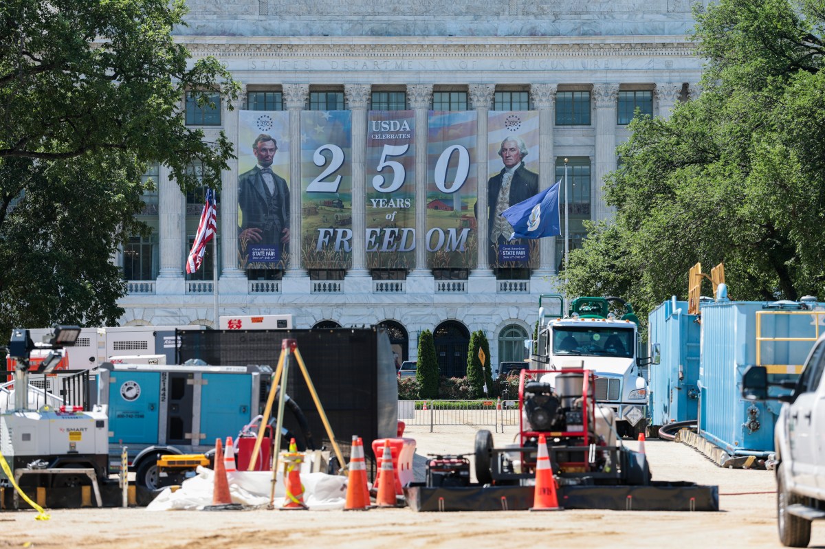 Workers build the Great American State Fair on the National Mall on May 28, 2026, in Washington, D.C.