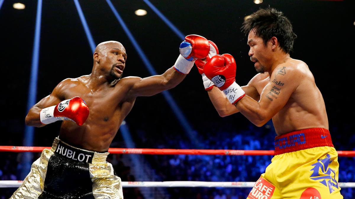 Luta de reencontro entre Mayweather e Pacquiao é adiada indefinidamente