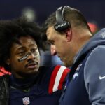 FOXBOROUGH, MA - JANUARY 4: Stefon Diggs #8 of the New England Patriots talks with head coach Mike Vrabel on the sidelines during the game against the Miami Dolphins at Gillette Stadium on January 4, 2026 in Foxborough, Massachusetts.(Photo By Winslow Townson/Getty Images)