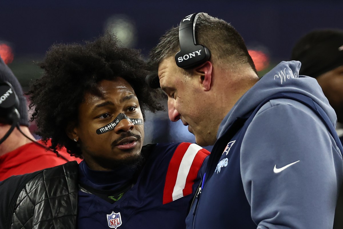 FOXBOROUGH, MA - JANUARY 4: Stefon Diggs #8 of the New England Patriots talks with head coach Mike Vrabel on the sidelines during the game against the Miami Dolphins at Gillette Stadium on January 4, 2026 in Foxborough, Massachusetts.(Photo By Winslow Townson/Getty Images)