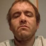 O homem preso em uma rua de Belfast por um requerente de asilo que o atacou brutalmente com uma faca foi identificado pelos moradores como Stephen Ogilvie.