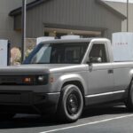 Slate Auto's Blank Slate truck charging at a Tesla Supercharger