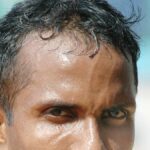 O ex-atleta Anil Kumar saúda o recorde nacional dos 100m de Gurindervir com orgulho e pesar