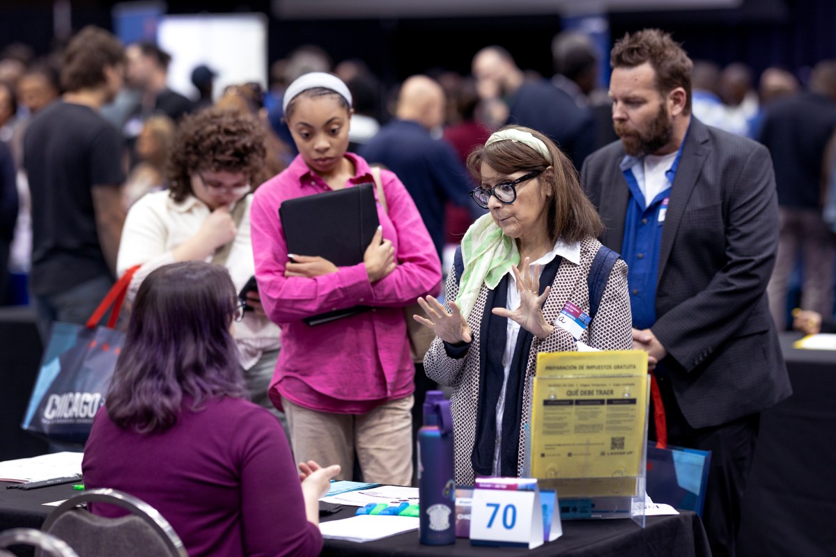 CHICAGO, ILLINOIS - SEPTEMBER 17: Job seekers are coached on interview practices with Amazon during a career fair held at Vertiport Chicago on September 17, 2019 in Chicago, Illinois. The event was one of several Amazon career fairs held across the country today as the company attempts to fill more than 30,000 full and part-time positions. (Photo by Scott Olson/Getty Images)