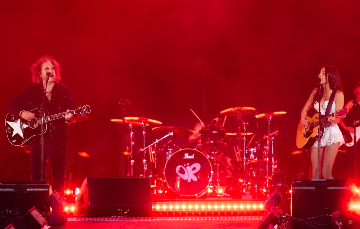 Olivia Rodrigo performs with Robert Smith