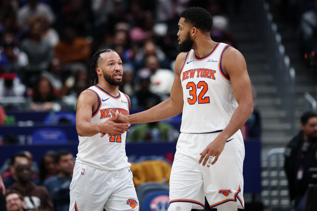 WASHINGTON, DC - FEBRUARY 03: Jalen Brunson #11 and Karl-Anthony Towns #32 of the New York Knicks celebrate after a play against the Washington Wizards during the second half at Capital One Arena on February 3, 2026 in Washington, DC.  (Photo by Scott Taetsch/Getty Images)