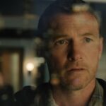 Sam Worthington em 'I Will Find You', sendo a 'donzela em perigo' do programa e resistindo a um romance de 'Telenovela' de David e Rachel