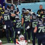 Seattle Seahawks' tight end #88 AJ Barner celebrates with teammates after scoring a touchdown during Super Bowl LX between the New England Patriots and the Seattle Seahawks at Levi's Stadium in Santa Clara, California on February 8, 2026. (Photo by Patrick T. Fallon / AFP via Getty Images)