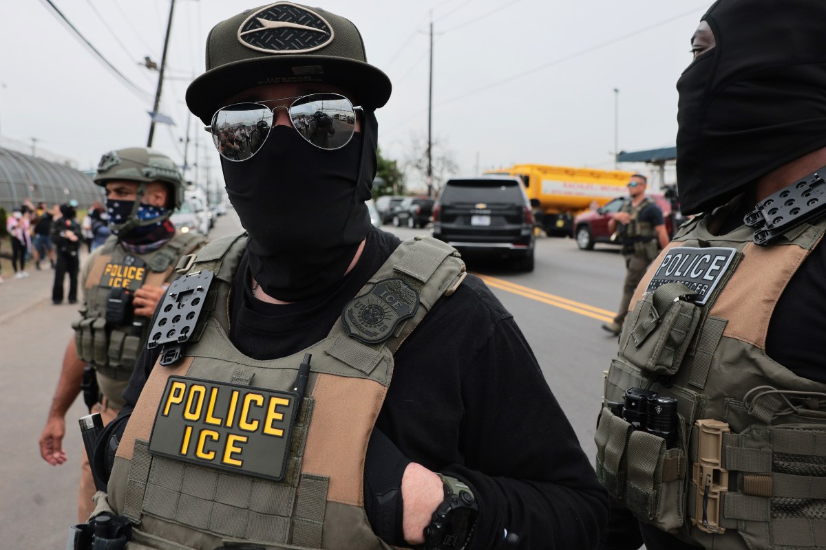 Immigration and Customs Enforcement agents stand guard outside Delaney Hall immigration detention center in New Jersey in May.