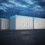 Battery packs from GM rendered against a darkened sky.