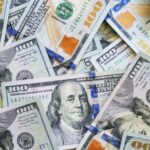 Quando podemos esperar aumentos de preços nos produtos Apple? | Foto de notas de US$ 100