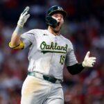 ANAHEIM, CALIFORNIA - JULY 26:  Seth Brown #15 of the Oakland Athletics reacts on a foul call against the Los Angeles Angels in the sixth inning at Angel Stadium of Anaheim on July 26, 2024 in Anaheim, California.  The call was overturned and Brown hit a RBI single.  (Photo by Ronald Martinez/Getty Images)