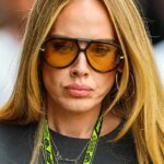 Adele abriu a cobertura na tarde de domingo para comparecer ao Grande Prêmio da Inglaterra em Silverstone ao lado de uma série de estrelas enquanto fazia uma aparição impressionante