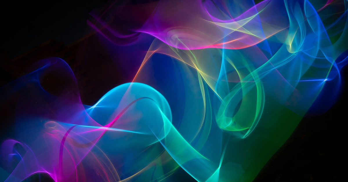 Apple chega a acordo com governo chinês sobre implementação do Apple Intelligence | Imagem abstrata colorida que lembra a animação da Siri