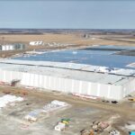 An aerial view of a battery factory under construction.