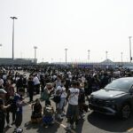 Milhares de torcedores e membros da mídia enfrentaram filas enormes para entrar no estádio para a final da Copa do Mundo no domingo, em meio a vários relatos de seguranças lutando para administrar a situação.