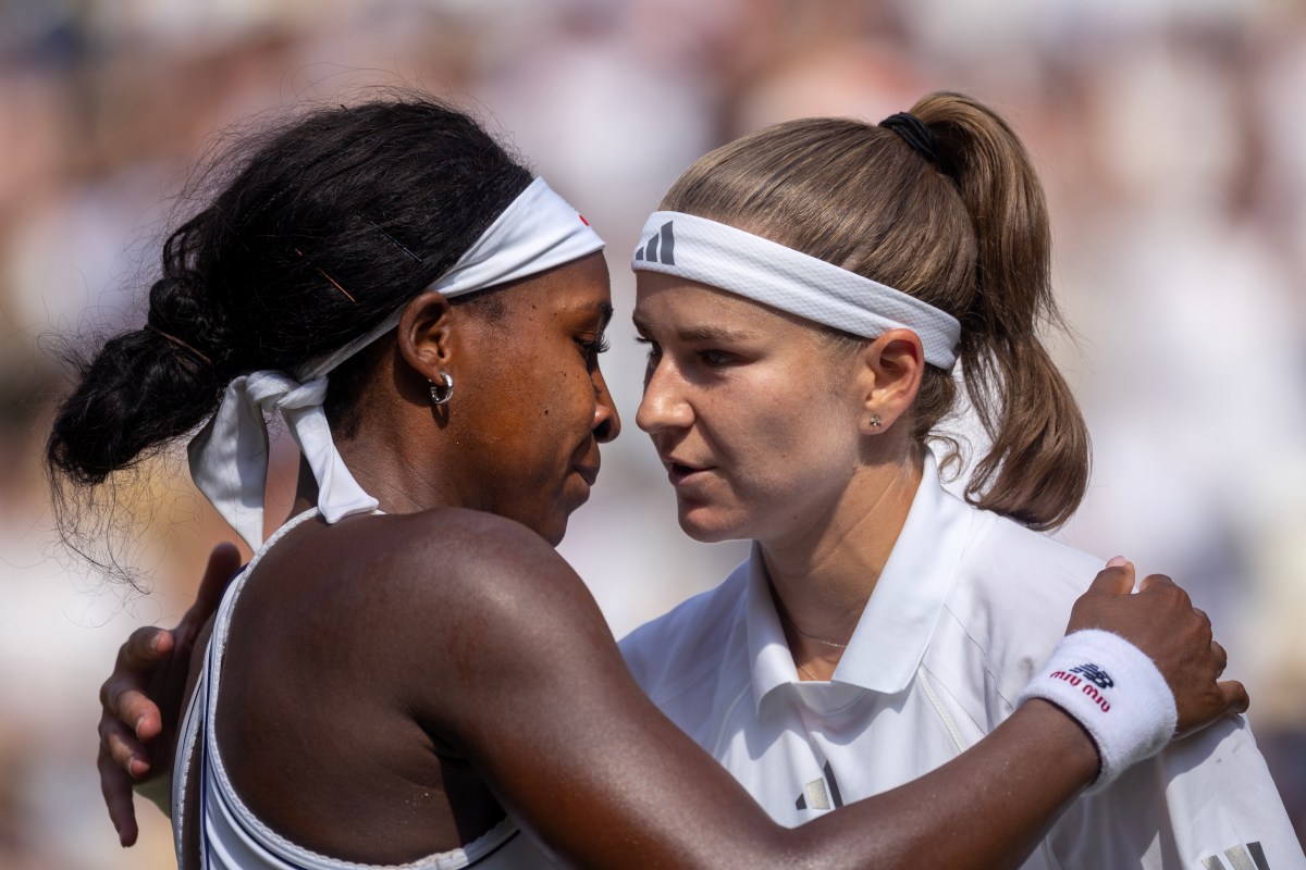 LONDON, ENGLAND - July 09: Winner Karolína Muchová of the Czech Republic is embraced at the net by Coco Gauff of the United States after their match in the semi-final of the Ladies' Singles Competition on Centre Court during the Wimbledon Lawn Tennis Championships at the All England Lawn Tennis and Croquet Club at Wimbledon on July 9th, 2026, in London, England. (Photo by Tim Clayton/Getty Images)