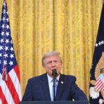 US President Donald Trump looks on after signing an executive order to drastically shrink two national monuments in Utah, paving the way for fossil fuel extraction and mining, at the Oval Office of the White House in Washington, DC, on July 13, 2026.