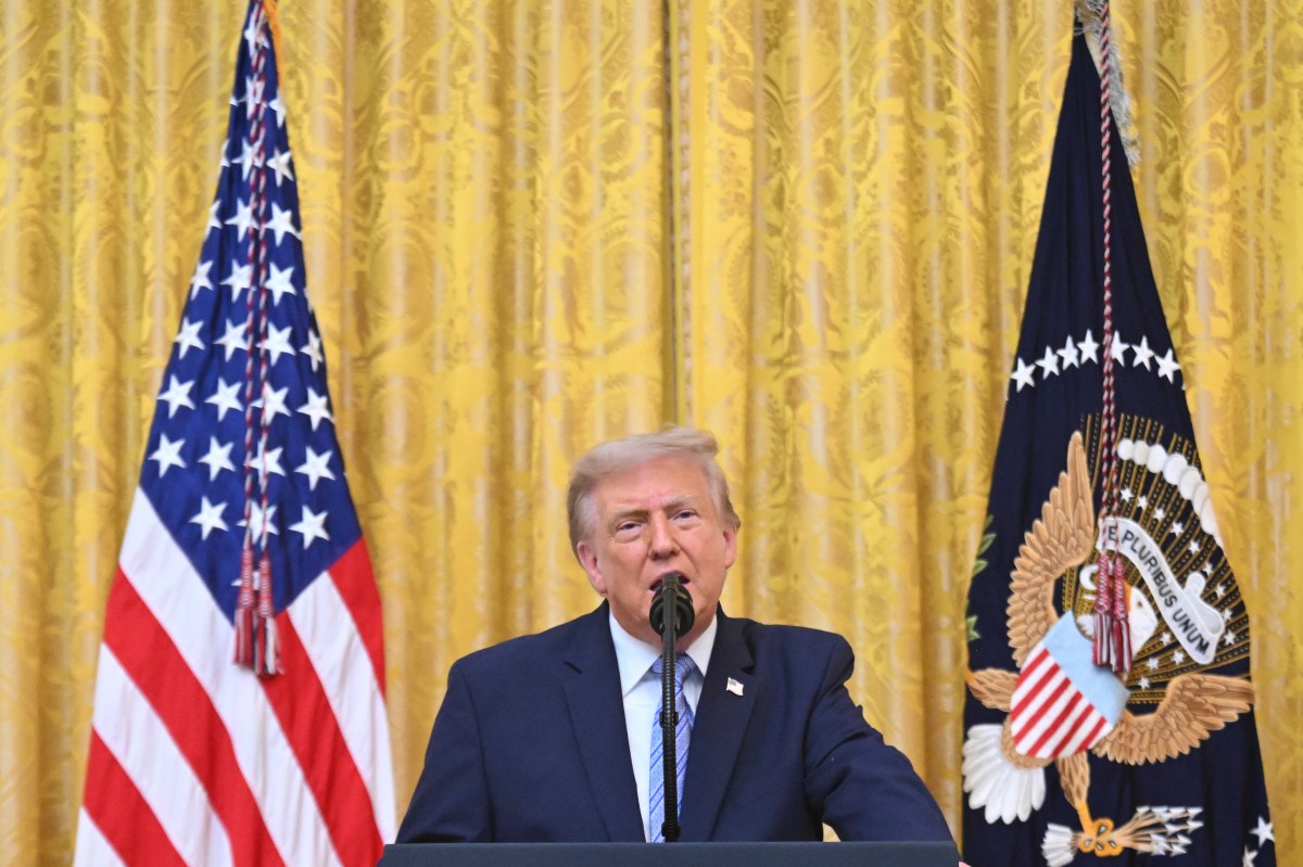US President Donald Trump looks on after signing an executive order to drastically shrink two national monuments in Utah, paving the way for fossil fuel extraction and mining, at the Oval Office of the White House in Washington, DC, on July 13, 2026.