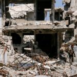 Em Jobar, na Síria, moradores lutam para reconstruir suas casas destruídas