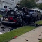A explosão de um carro espalhou destroços por uma rua residencial e danificou casas próximas em Totowa, Nova Jersey, em 13 de julho.