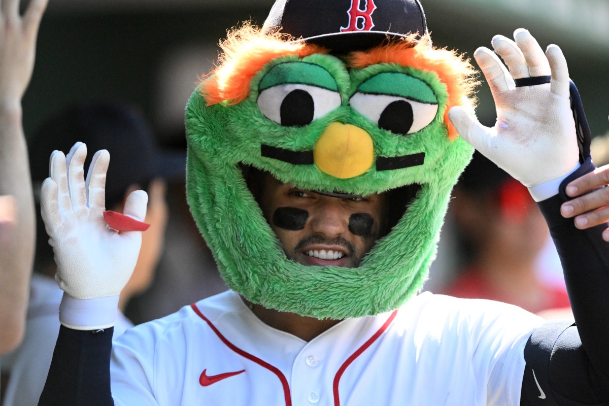 BOSTON, MASSACHUSETTS - JULY 17: Carlos Narváez #75 of the Boston Red Sox celebrates with his teammates after hitting a solo home run against the Tampa Bay Rays  during the seventh inning of game one of a doubleheader at Fenway Park on July 17, 2026 in Boston, Massachusetts.  (Photo by Brian Fluharty/Getty Images)