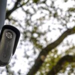 A Flock surveillance camera in Houston, Texas, US, on Wednesday, Feb. 4, 2026. Flock counts more than 6,000 customers that are using its license plate readers, camera-equipped drones, gunshot detection devices and software, with customers in every state except Alaska. Photographer: Antranik Tavitian/Bloomberg via Getty Images