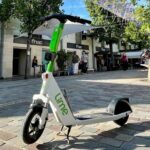 Lime scooter with computer vision system, including camera, attached to the neck